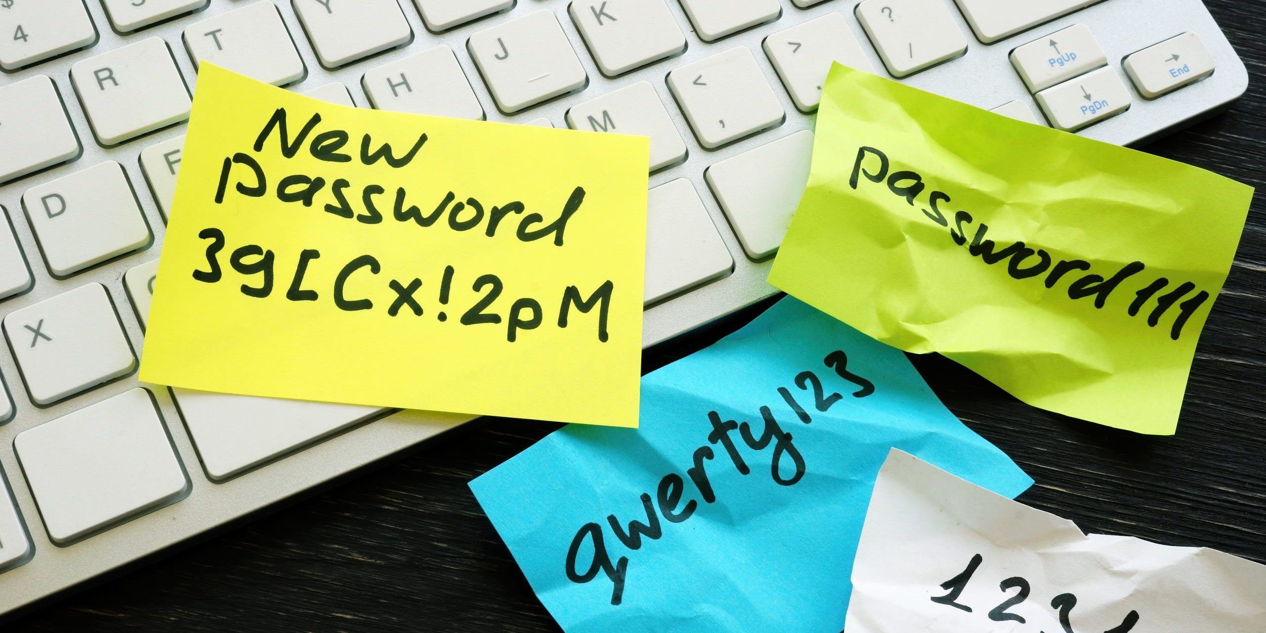 New strong password and weak ones near keyboard. How to secure your passwords
